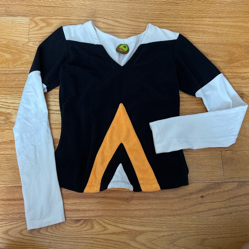 Black and White Long Sleeve Top with Orange Accent